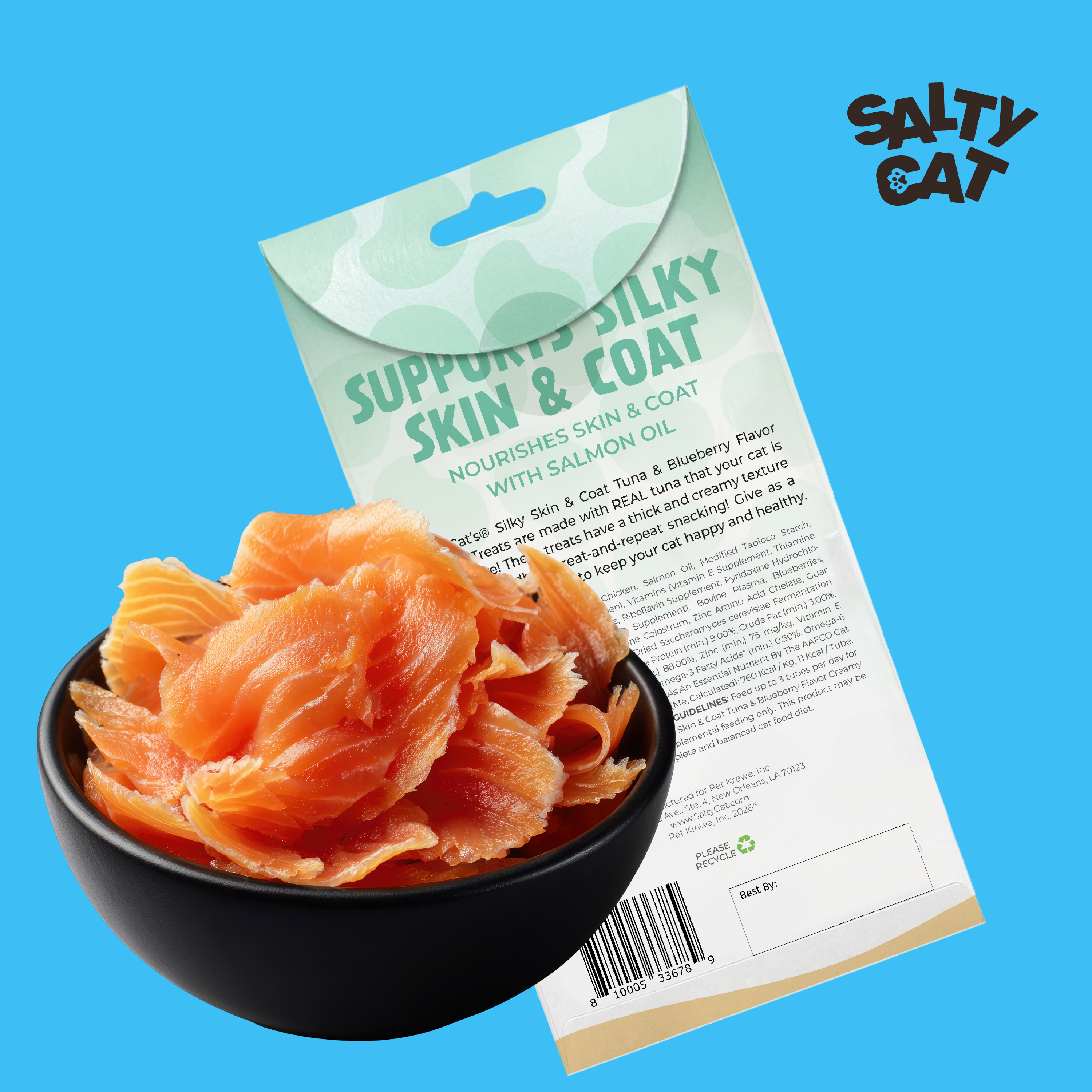 A black bowl of VitaCat by Salty Cat Chill Out treats is in front of the package on blue.